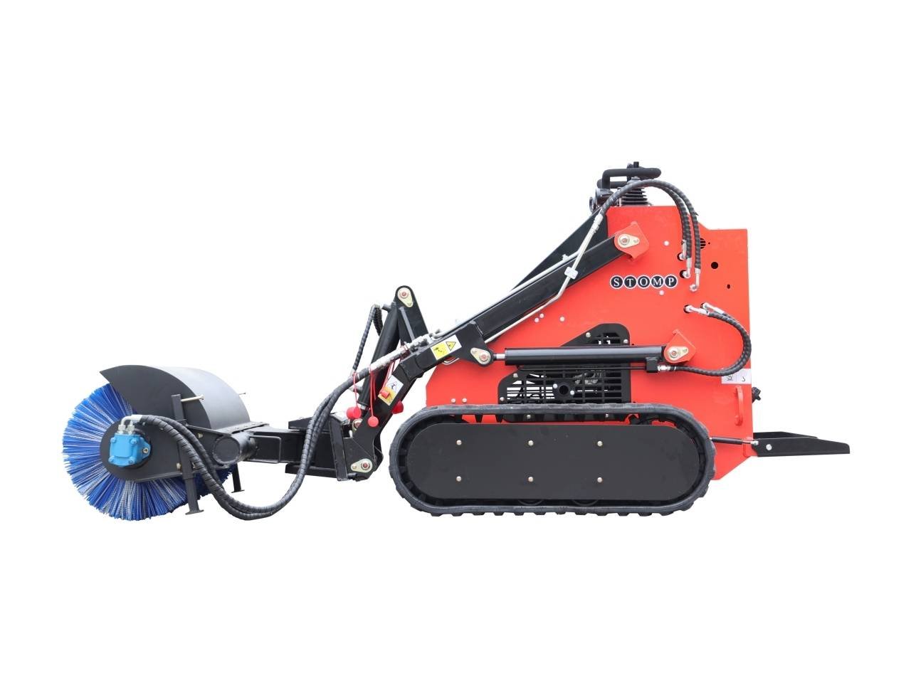 Red compact tracked street sweeper with a large blue rotating brush at the front for sidewalk cleaning (STOMP machine).